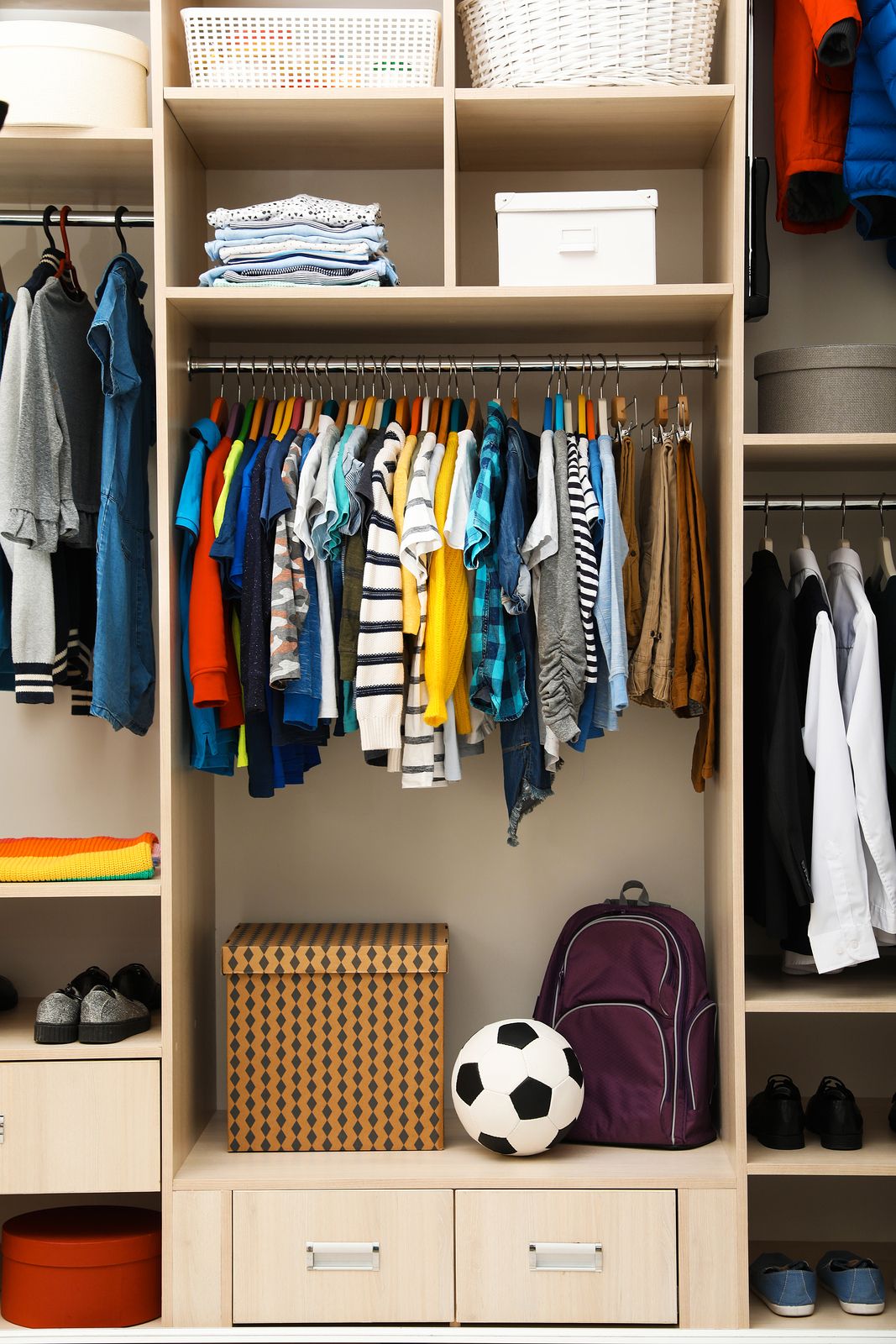 https://www.timberarmarios.com/wp-content/uploads/2019/03/bigstock-Large-Wardrobe-With-Teenager-C-272117977.jpg